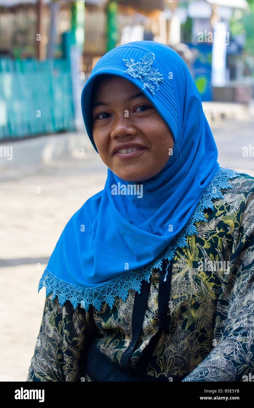 Teenage Muslim Girl on Gili Trawangan on Lombok Island in Indonesia Stock Photo