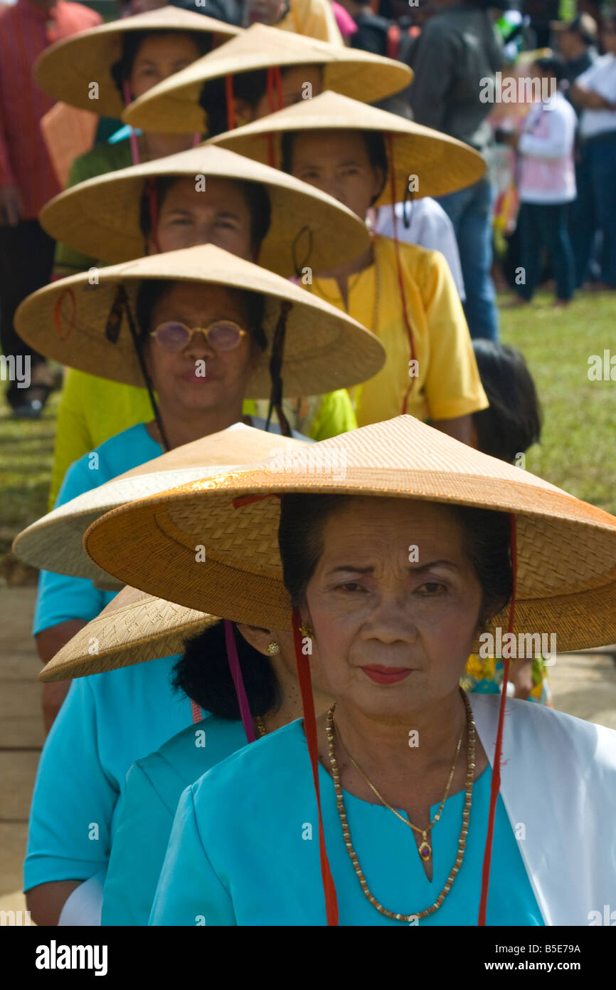 Women Wearing Traditional Hats During National Day Festival in Rantepao on Sulawesi in Indonesia Stock Photo