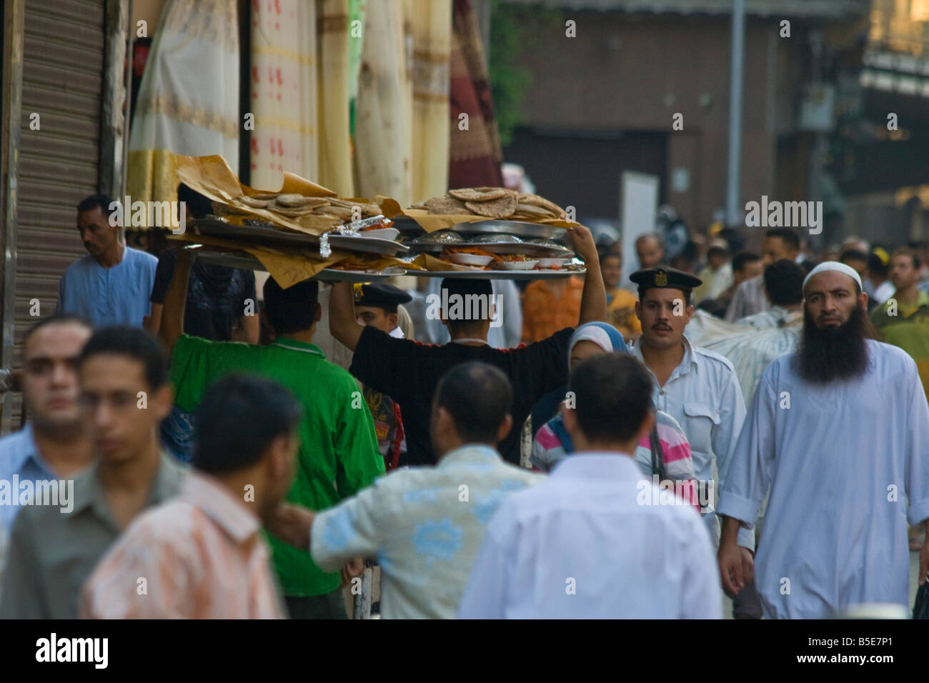 Crowded Pedestrian Street with Delivery Ramadan Meals in Islamic Cairo Egypt Stock Photo