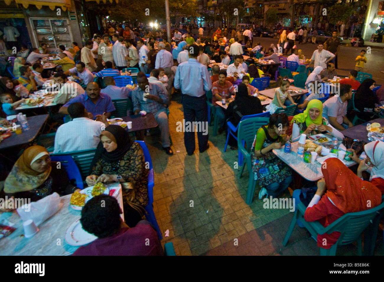 Crowd Outside Gad Restaurant during Ramadan in Downtown Cairo Stock Photo