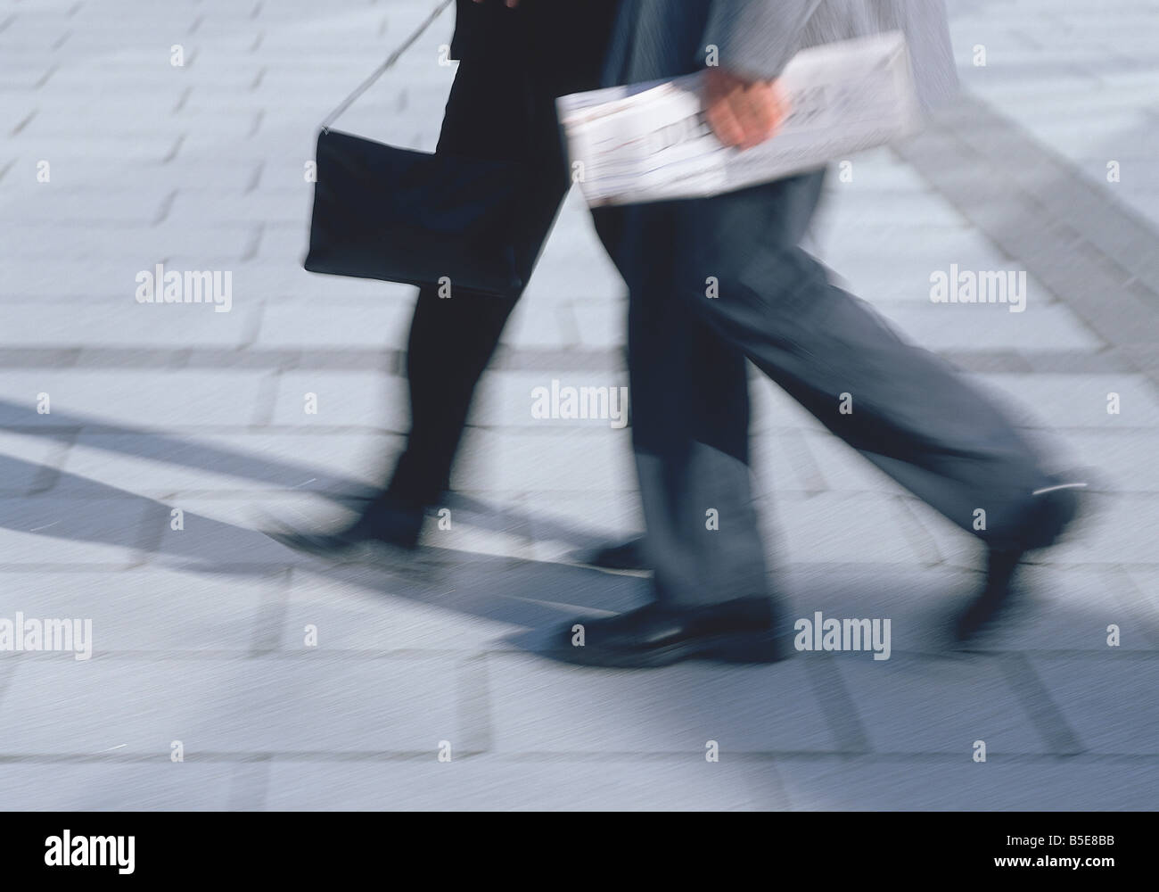 Two businesspeople passing Stock Photo