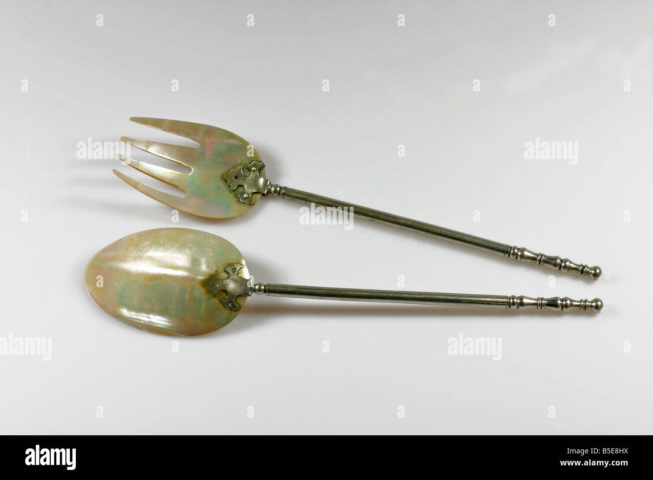 Antique Fork and Spoon salad servers made from Mother of Pearl and Silver Stock Photo