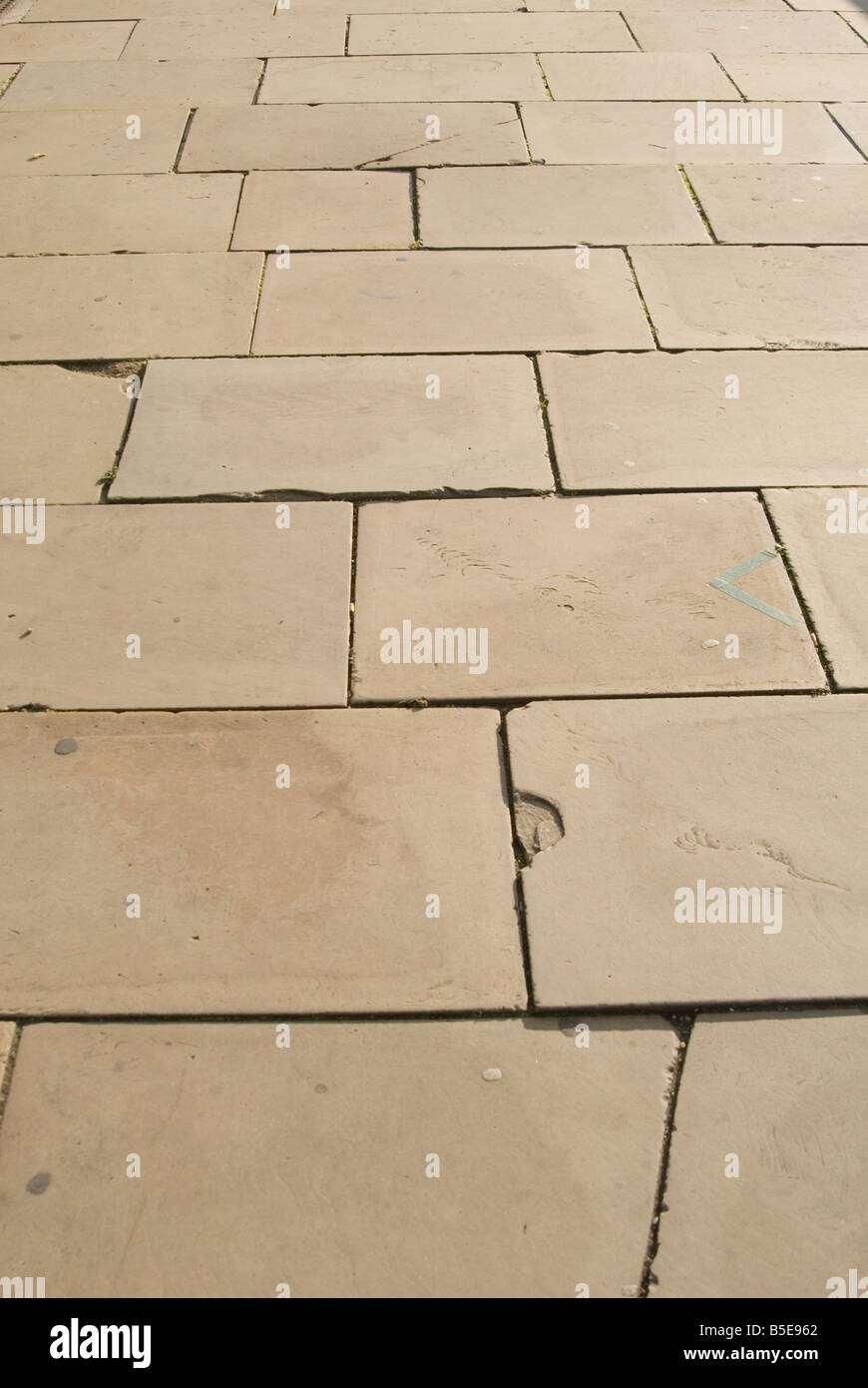 An image of paving slabs on a pathway or sidewalk the paving slabs fill the image Stock Photo