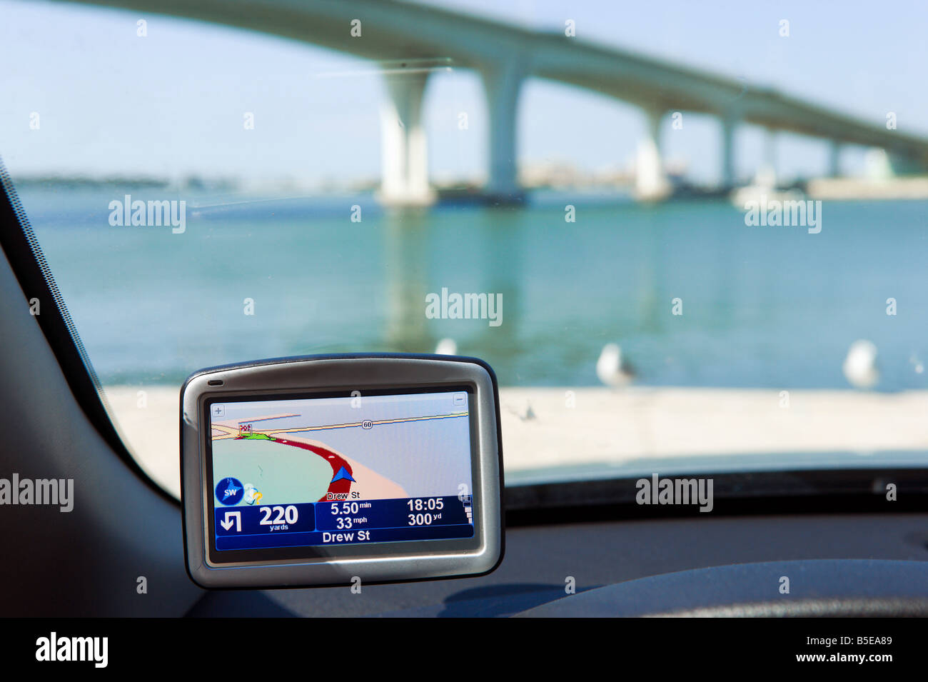 GPS Satellite Navigation System on the windscreen of a car in Clearwater, Florida, USA Stock Photo