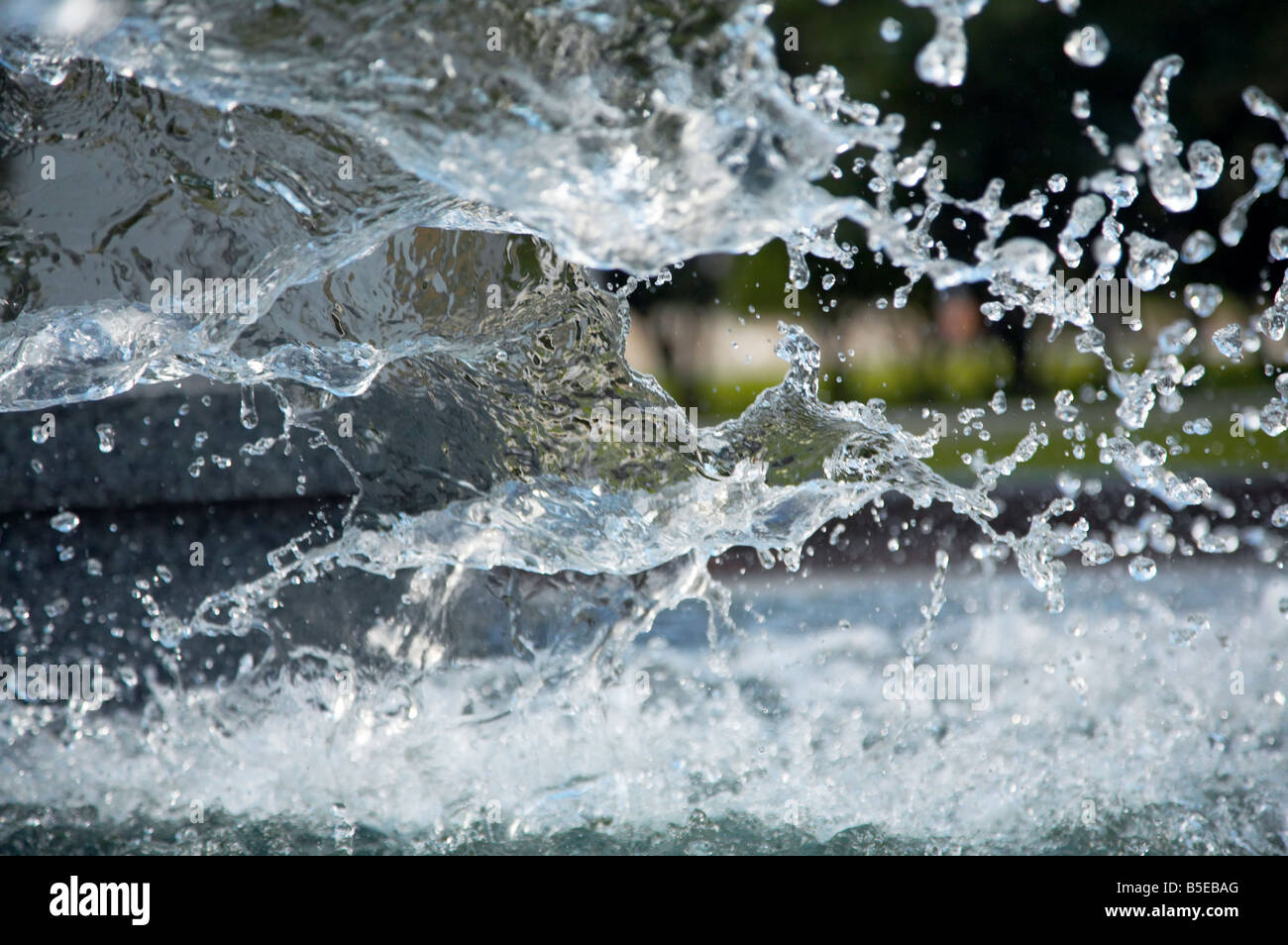 Splashes of water in city fountain Stock Photo