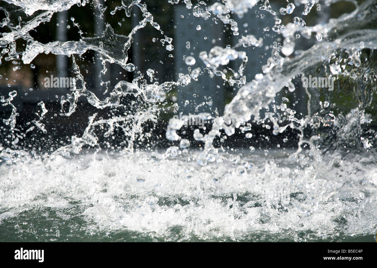 Splashes of water in city fountain Stock Photo