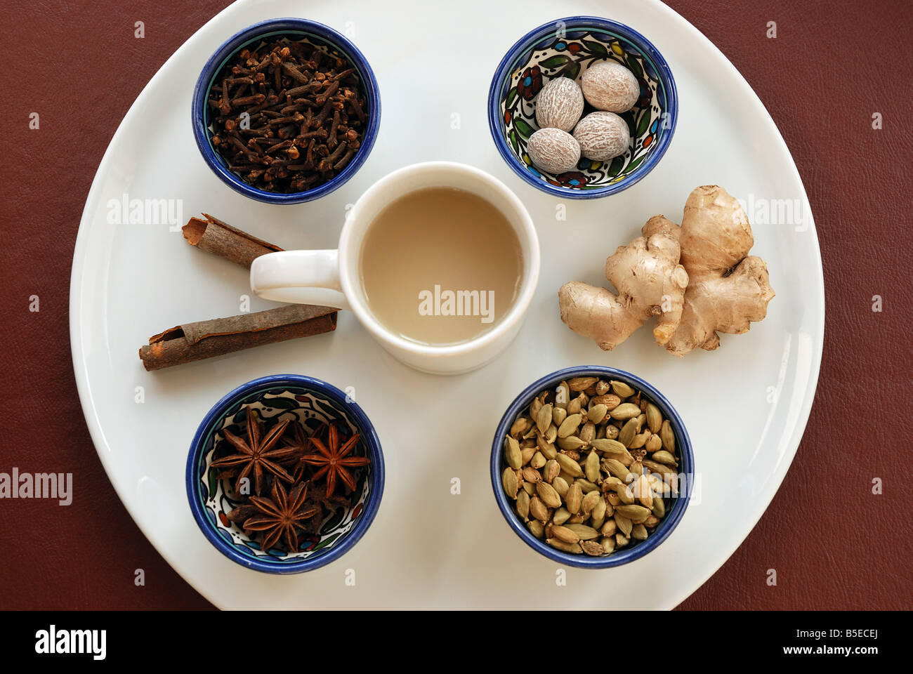 Masala chai  (spiced tea), the Indian tea made with a mixture of aromatic Indian spices and herbs. Stock Photo