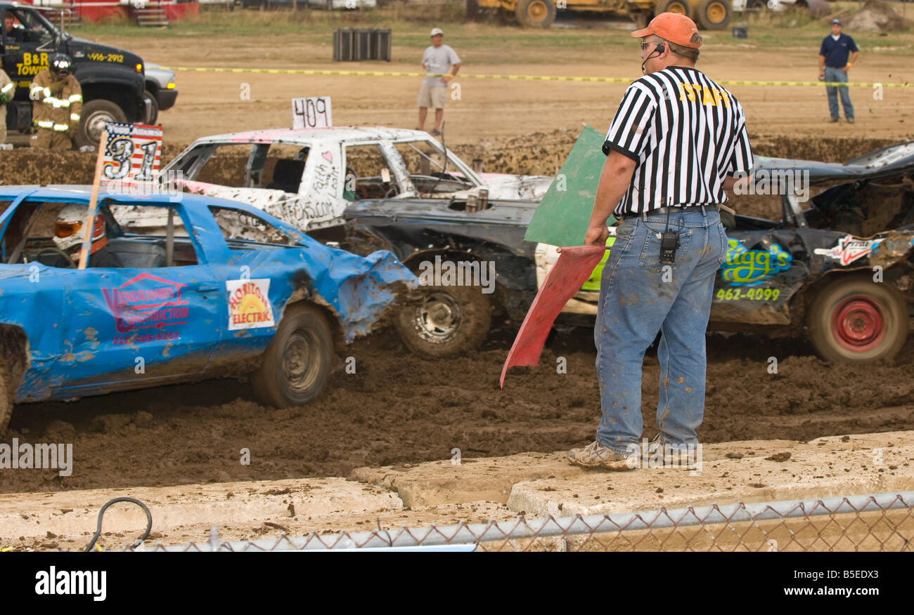 Referee overlooking action at a demolition derby Stock Photo