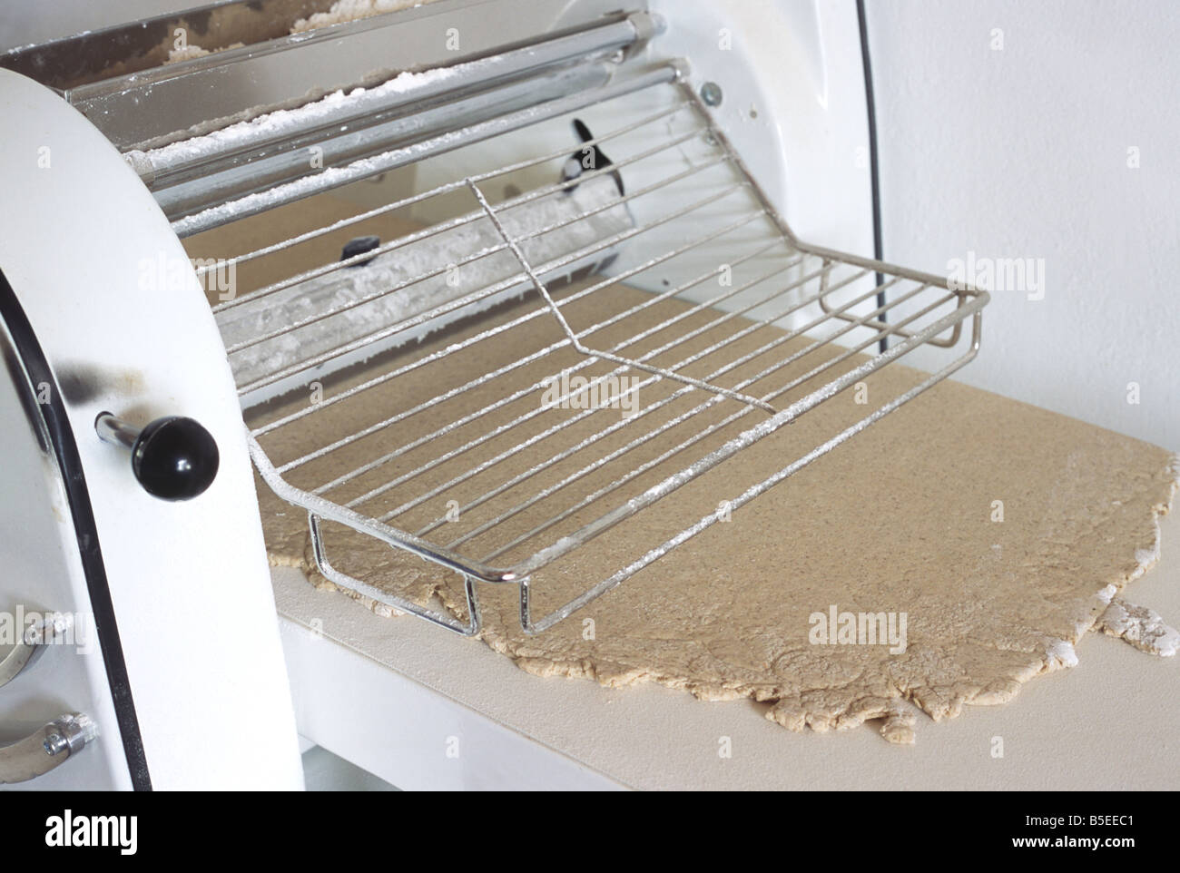 Dough in machine for a Yamokouloura Stock Photo