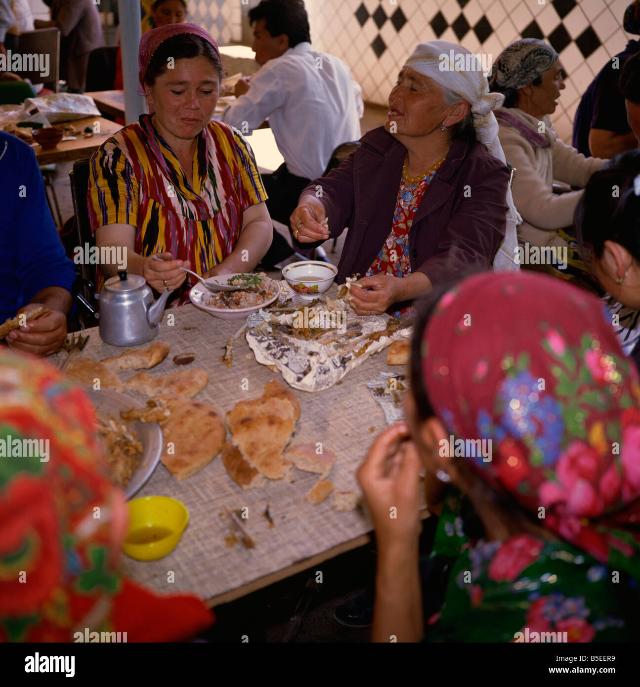 Uzbek women at tea house, Bukhara, Uzbekistan, Central Asia Stock Photo