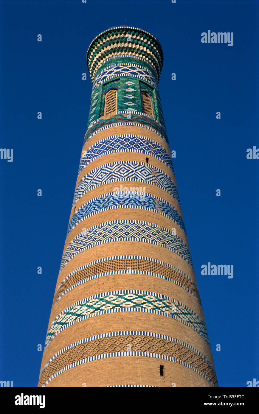 Architectural details of bricks and tiles on the Islom-Huja minaret in Khiva, Uzbekistan, Central Asia Stock Photo
