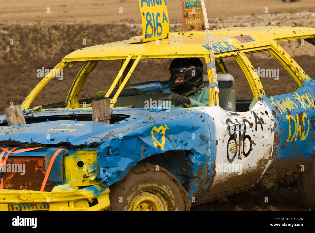 Driver in a demolition derby Stock Photo