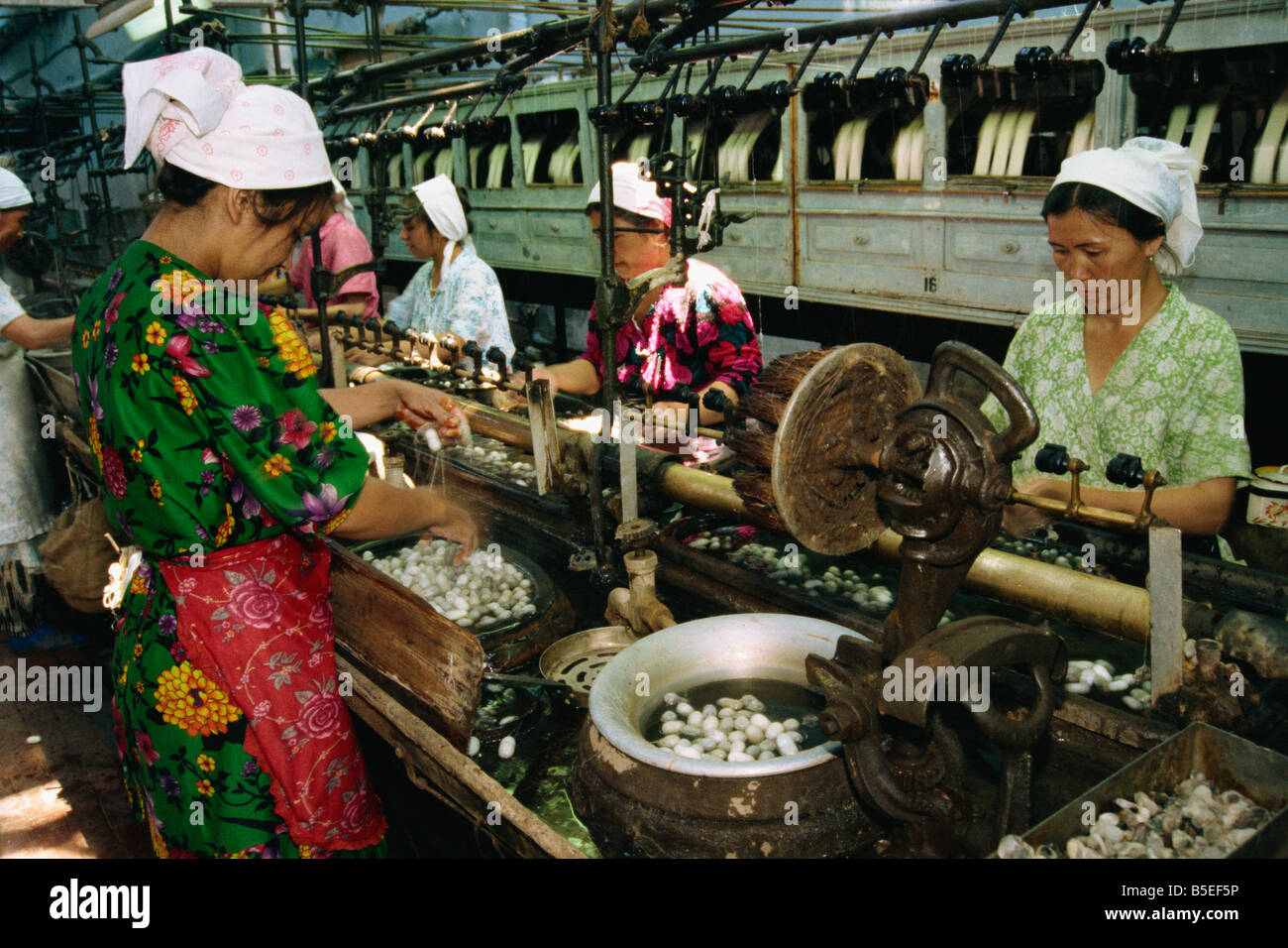 Cocoon treatment, silk factory, Margilan, Ferghana Valley, Uzbekistan, Central Asia Stock Photo