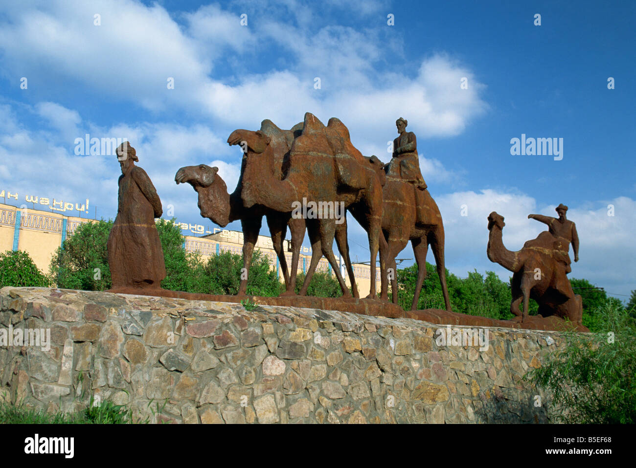 Statues of camels and camel drivers on Silk Road monument near the Registan in Samarkand Uzbekistan Central Asia G Hellier Stock Photo