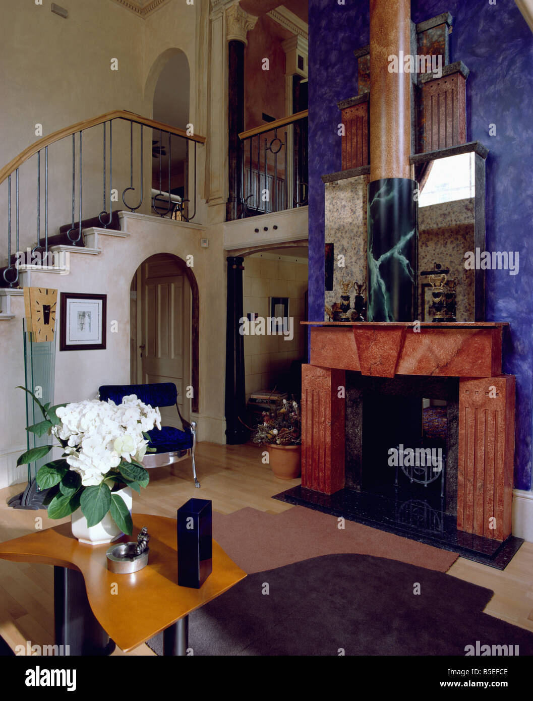 Painted Marble Effect Red Fireplace On Blue Wall In Eighties Hall