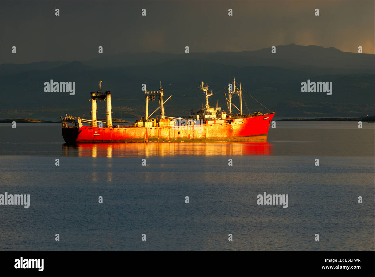Ship in the beagle canal by sunset Stock Photo