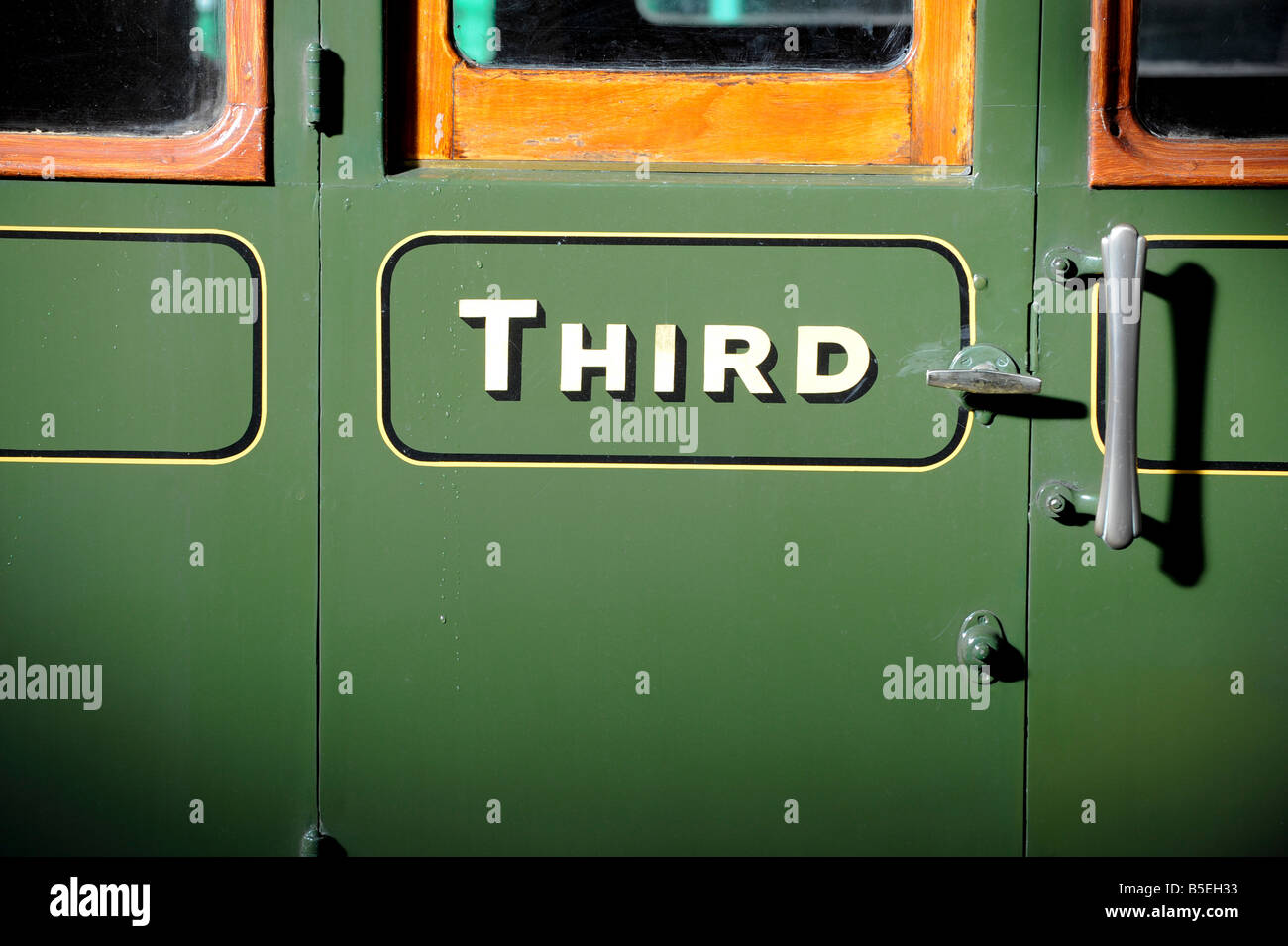 The Bluebell Railway in East Sussex. A carriage door of a third class travel compartment on the preserved steam railway. Stock Photo