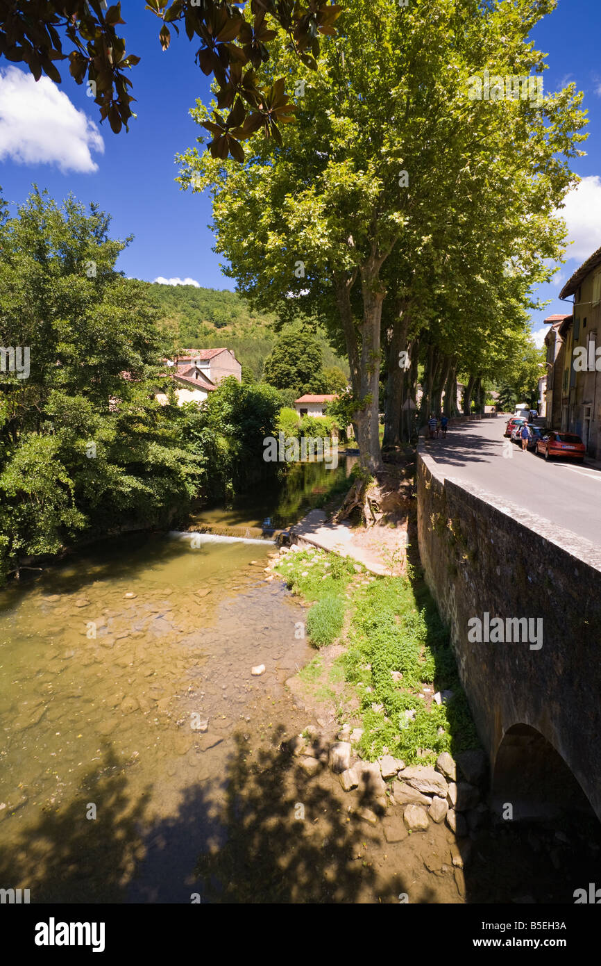 Small stream runs next to the road at Saint Antonin Noble Val, Tarn et Garonne, France Europe Stock Photo