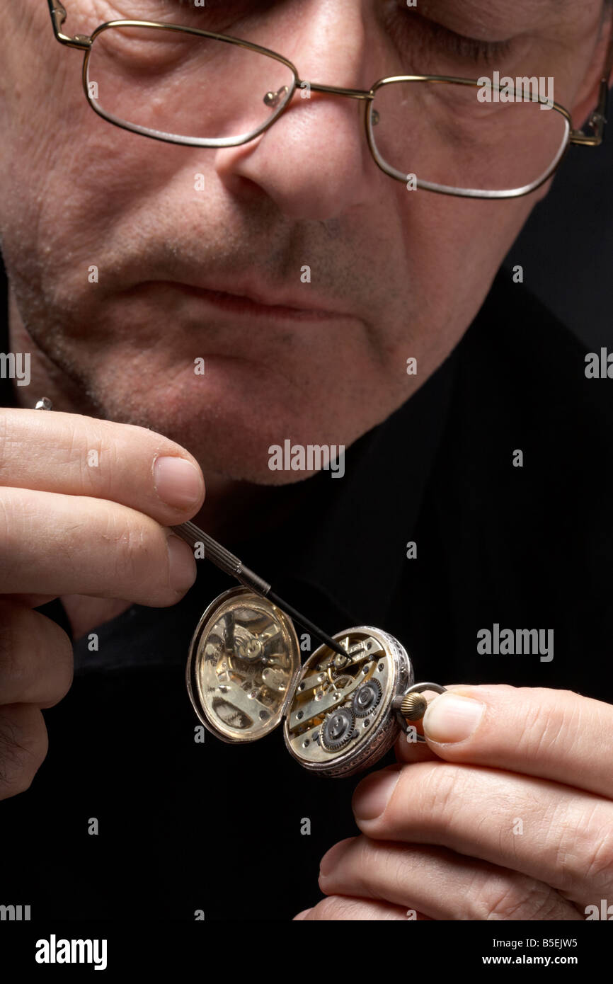 Repairing an old pocket watch Stock Photo Alamy