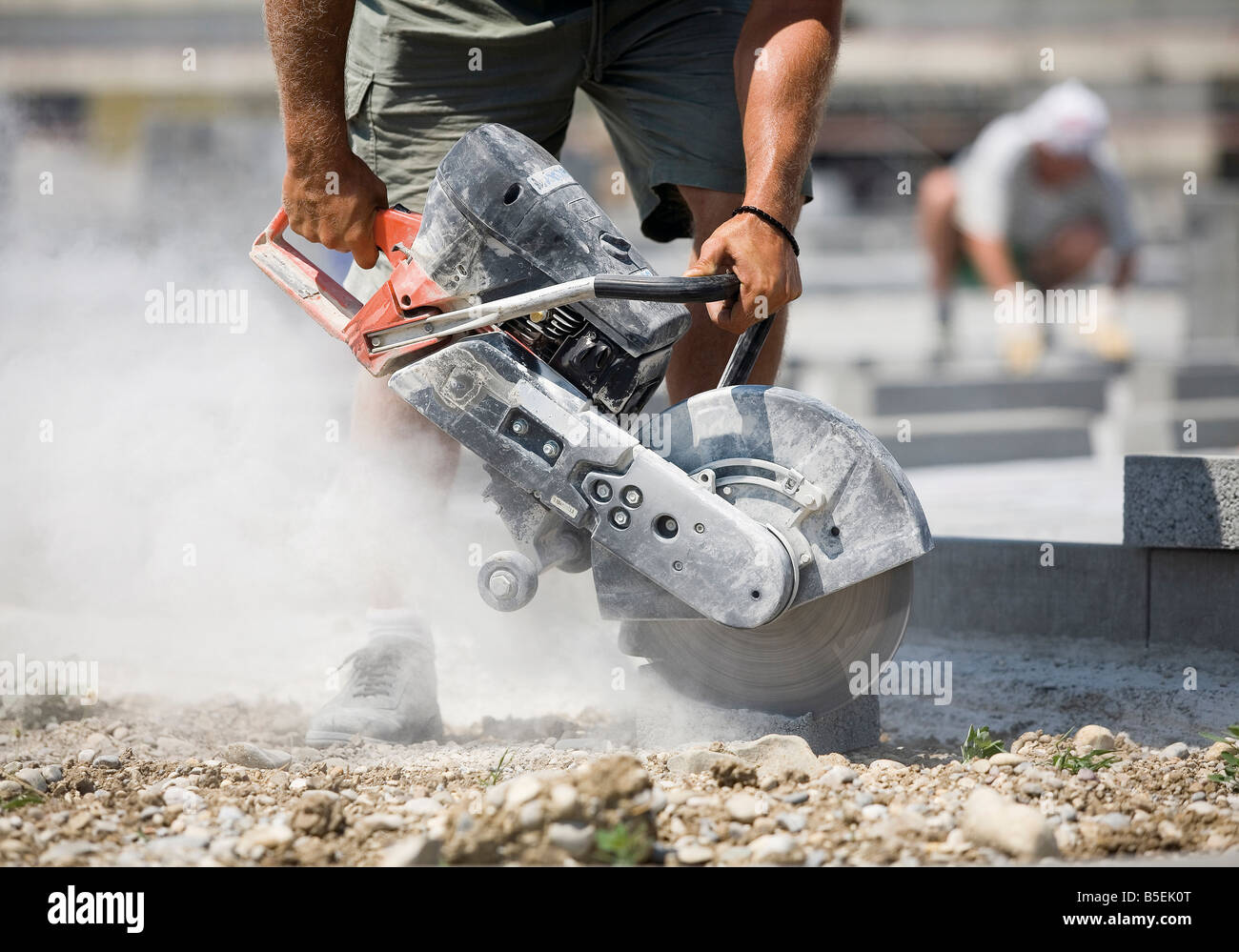 Construction worker using angle grinder Stock Photo Alamy