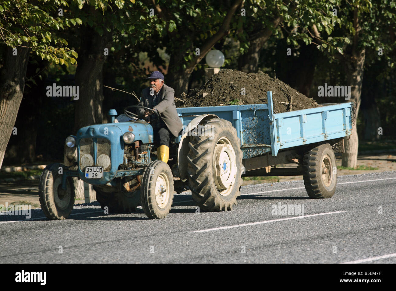 A man driving a tractor, Kusadasi, Turkey Stock Photo - Alamy
