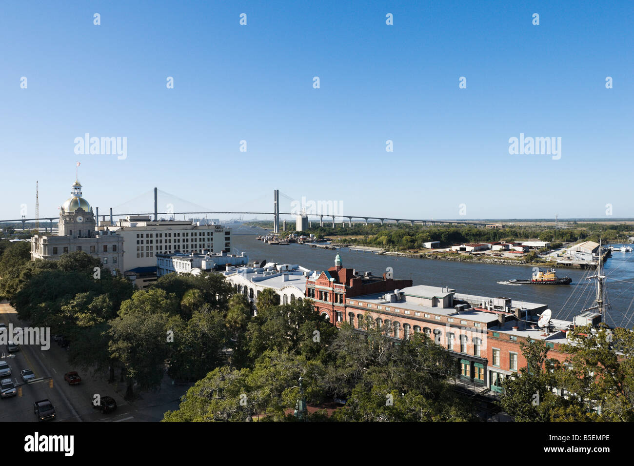 View over the Savannah River looking down Bay Street towards City Hall and the Talmadge Memorial Bridge, Savannah, Georgia, USA Stock Photo