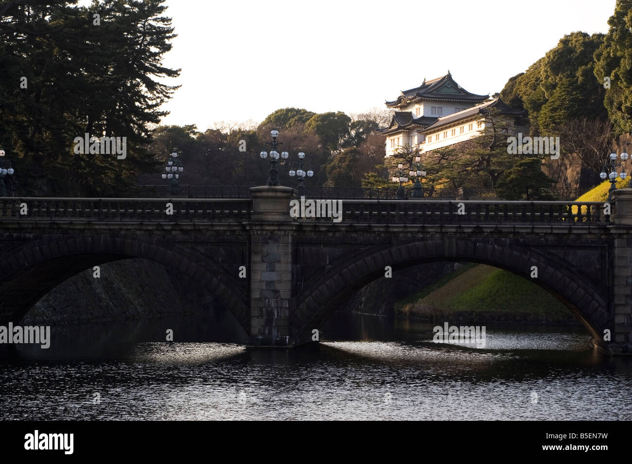 The Imperial Palace in Tokyo, Japan. The Nijubashi stands in the foreground in the East Garden of the Imperial Palace. Stock Photo