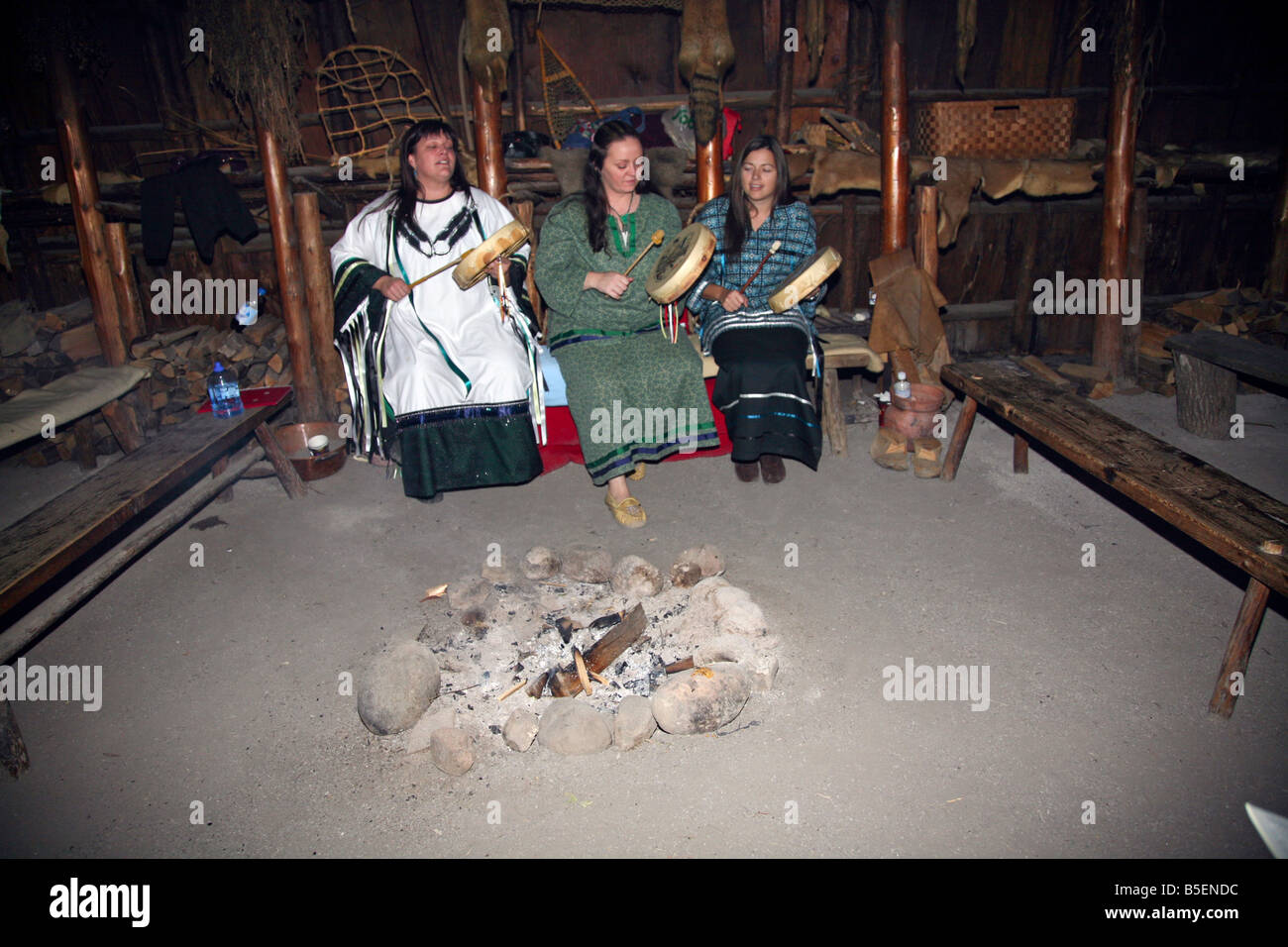 Three Indian Maiden making music they are from the Huron tripe near Midland Ontario Canada Stock Photo