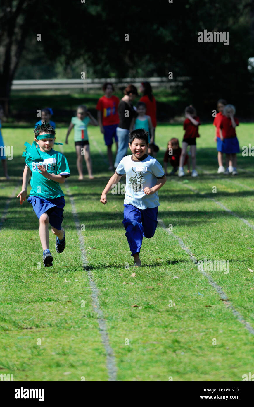 Children running at Primary School Athletics Carnival, Australia Stock Photo