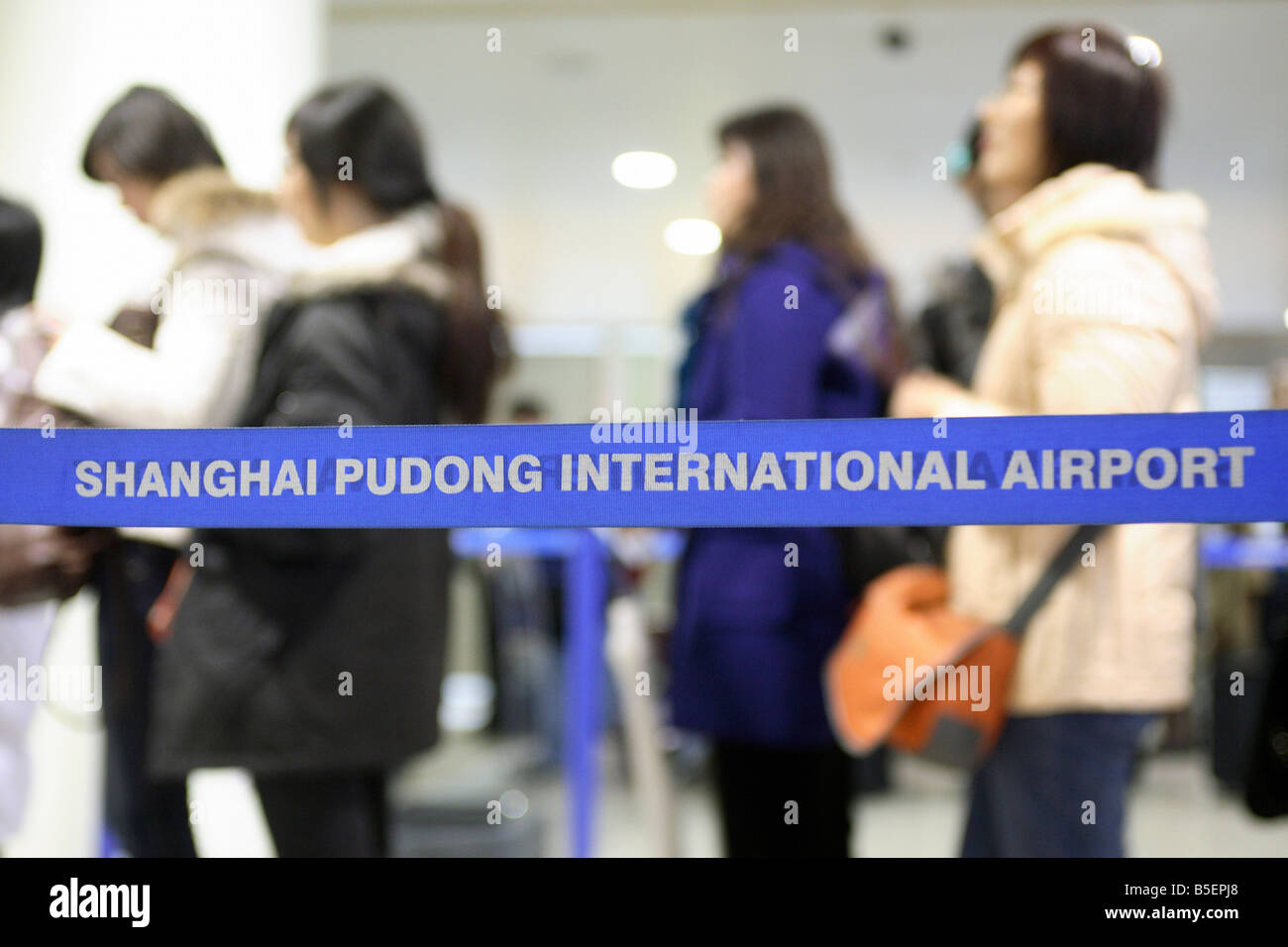 Tourists at the Shanghai Pudong International Airport, Shanghai, China Stock Photo