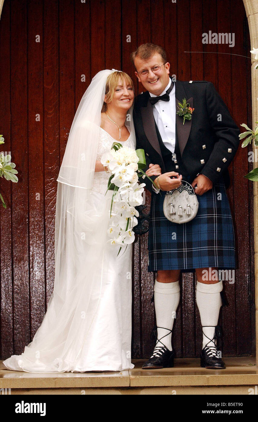 LOTTERY WINNER JOHN MCGUINNESS July 2003 WEDS HIS FIANCEE SANDRA BAIRD AT ST PATRICK S RC CHURCH SHOTTS Stock Photo