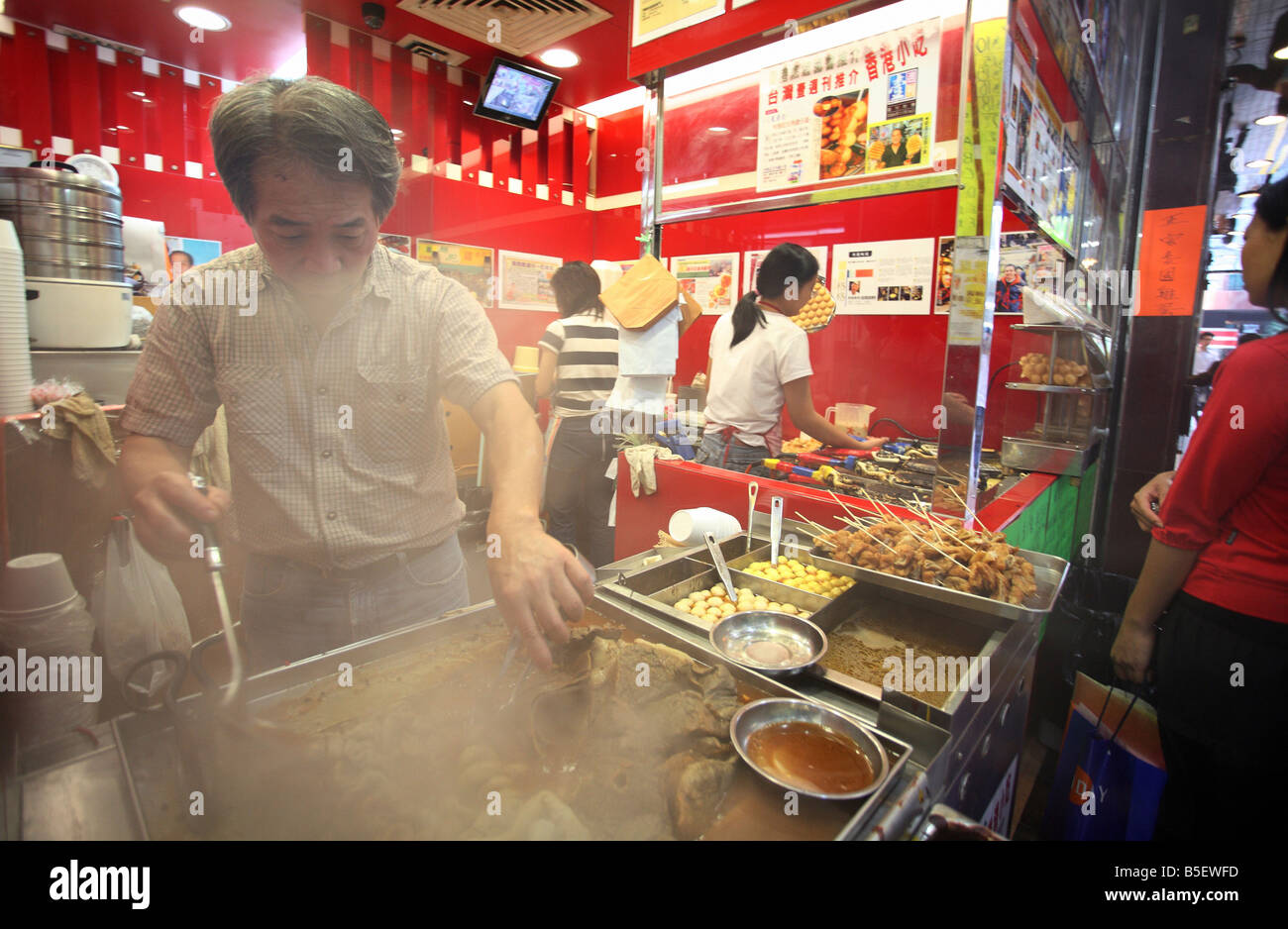 A street bar with traditional Chinese food in Hong Kong, China Stock