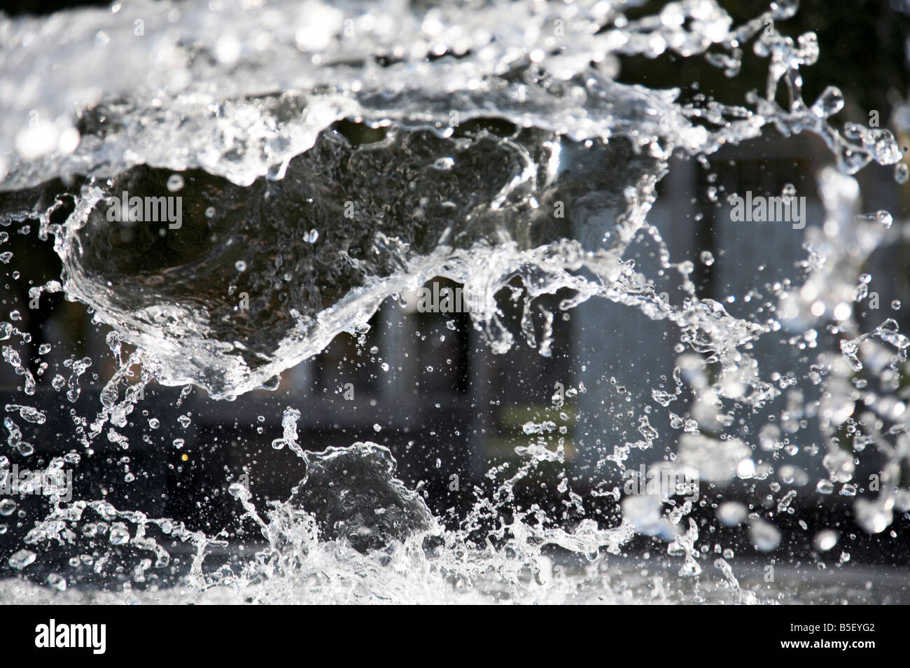 Splashes of water in city fountain Stock Photo