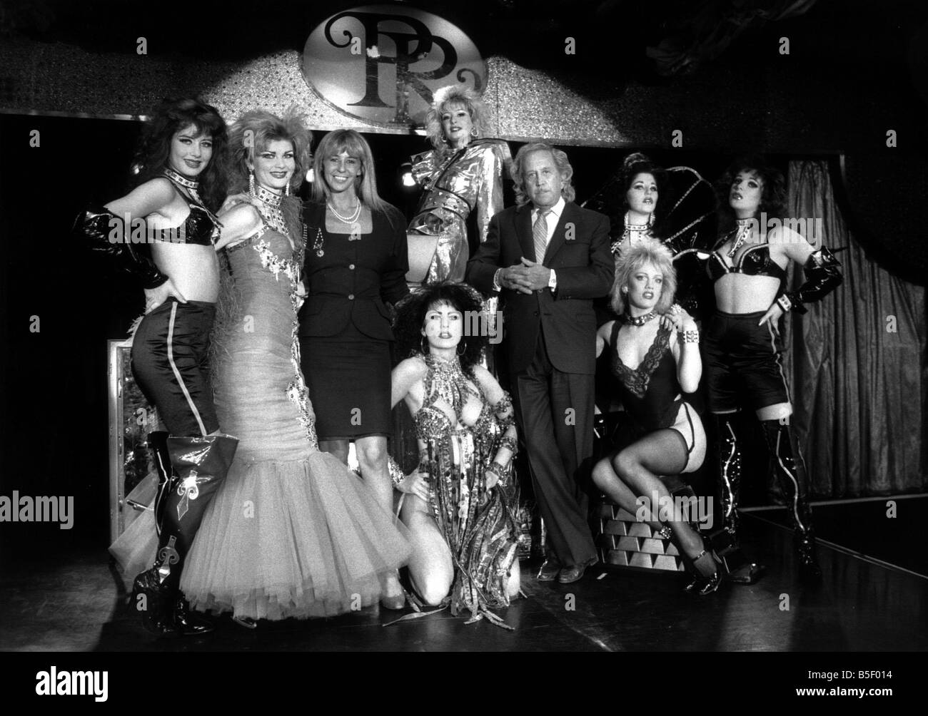 Paul Raymond with girls from Paul Raymond Revue Bar 1988 and daughter