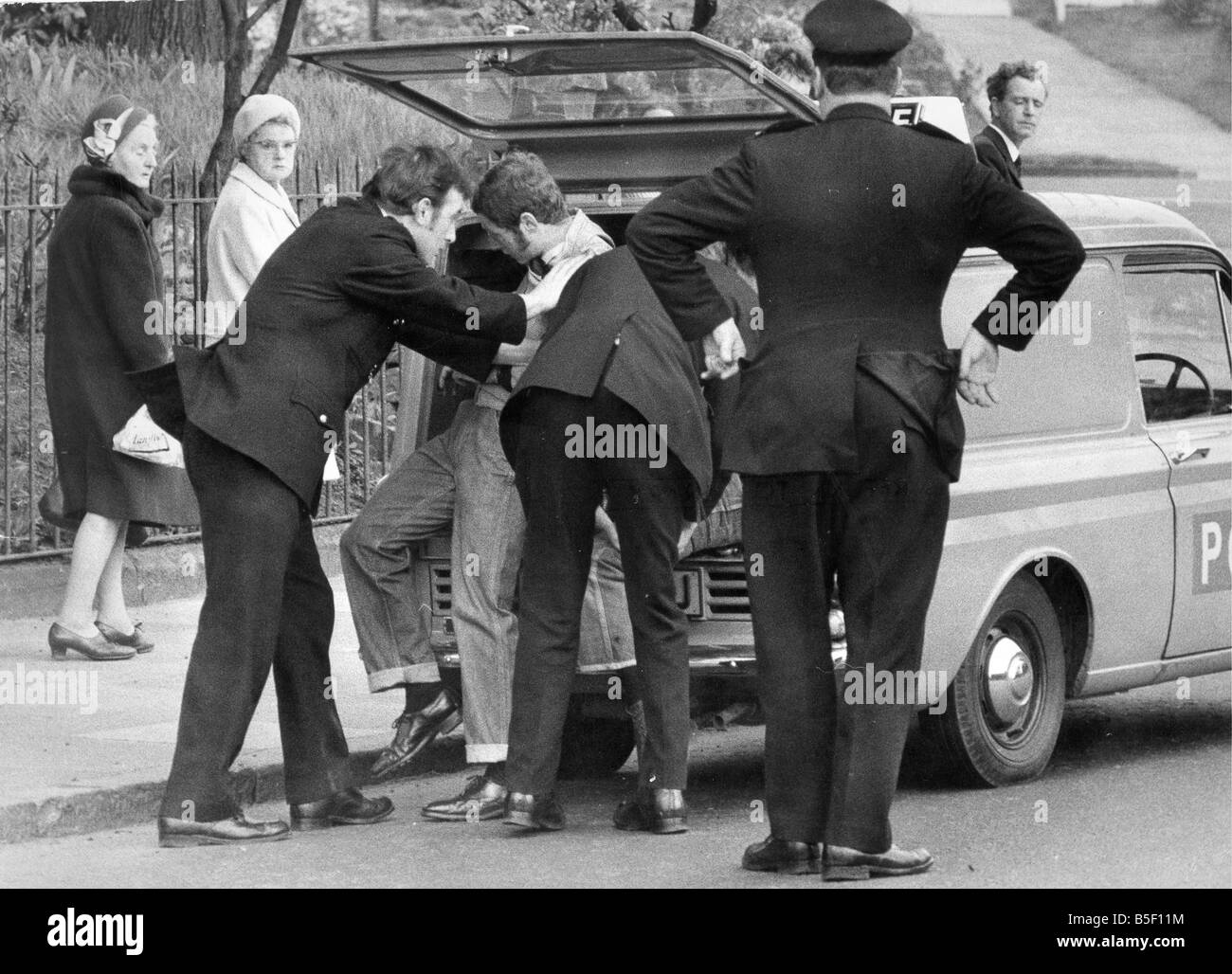 Arrested man 1970s hi-res stock photography and images - Alamy