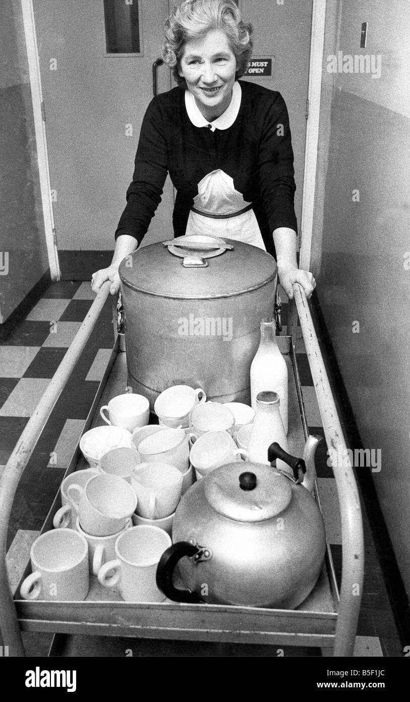 A possible victim of the office revolution in the 1970s The familiar figure of the friendly tea lady with her trolley may be replaced by a vending machine Stock Photo