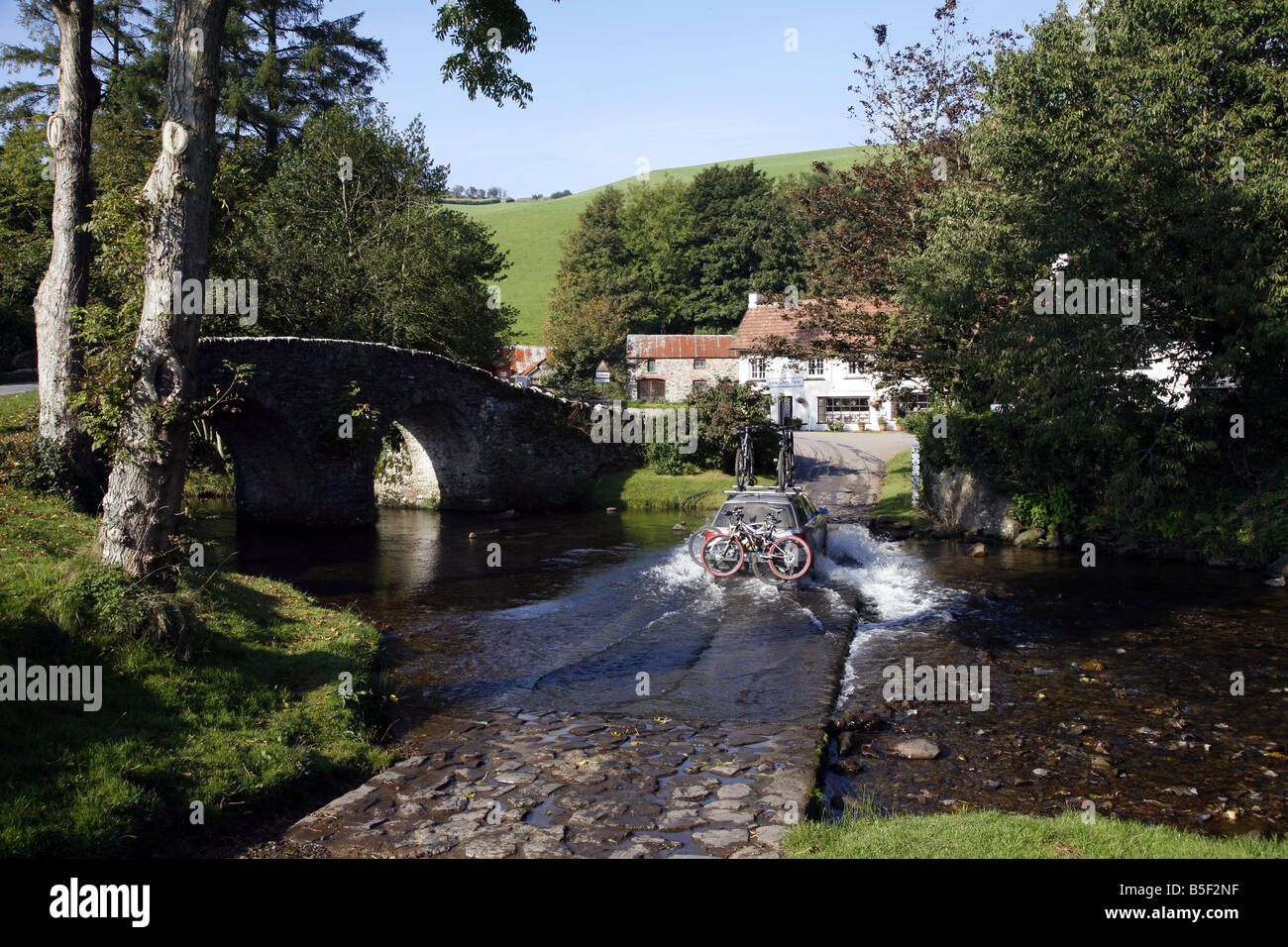 The Pretty Exmoor Hamlet Of Malmsmead On Badgworthy Water In The Doone the-pretty-exmoor-hamlet-of-malmsmead-on-badgworthy-water-in-the-doone