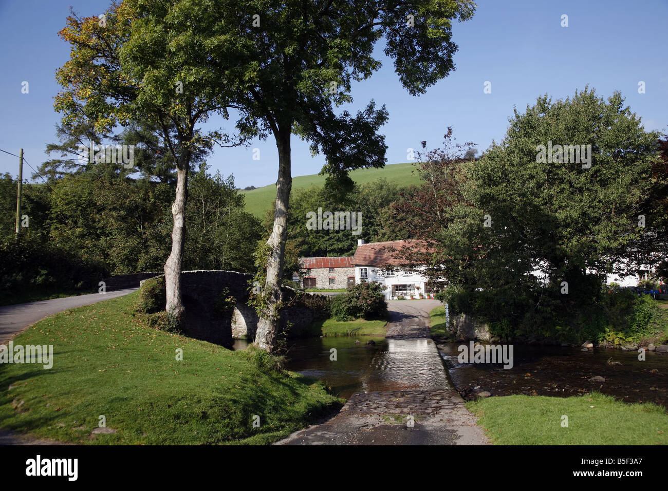 The Pretty Exmoor Hamlet Of Malmsmead On Badgworthy Water In The Doone the-pretty-exmoor-hamlet-of-malmsmead-on-badgworthy-water-in-the-doone