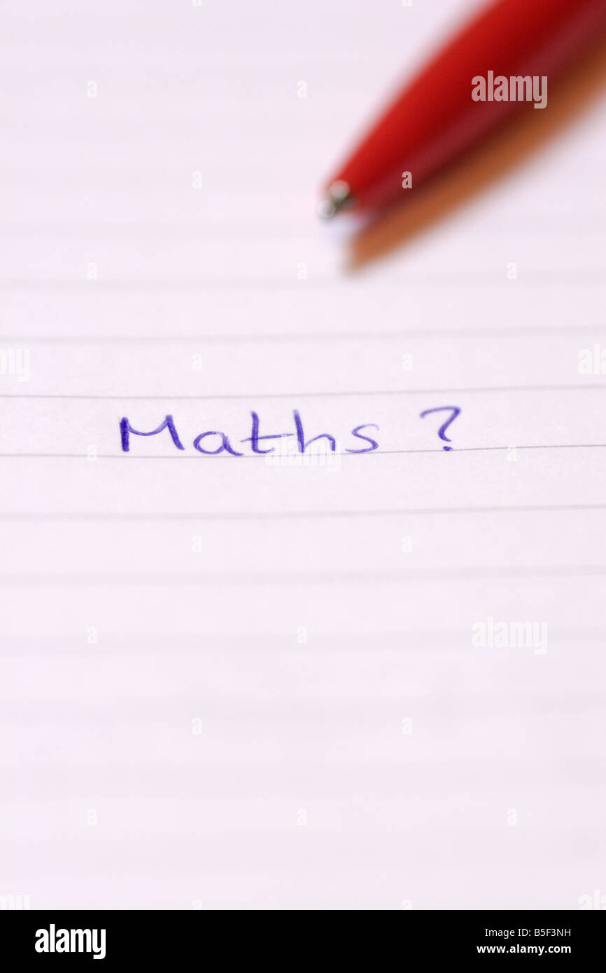maths writen on lined paper with red biro pen close up Stock Photo