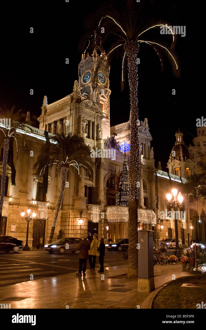 Clock tower at christmas lights on street in valencia spain hires