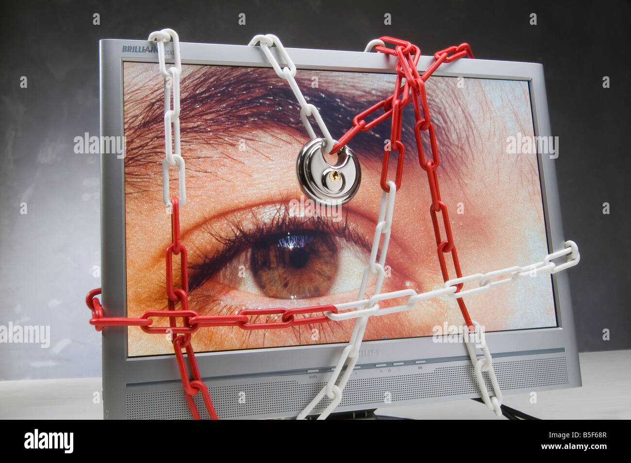 The eye of a man on a computer screen Stock Photo