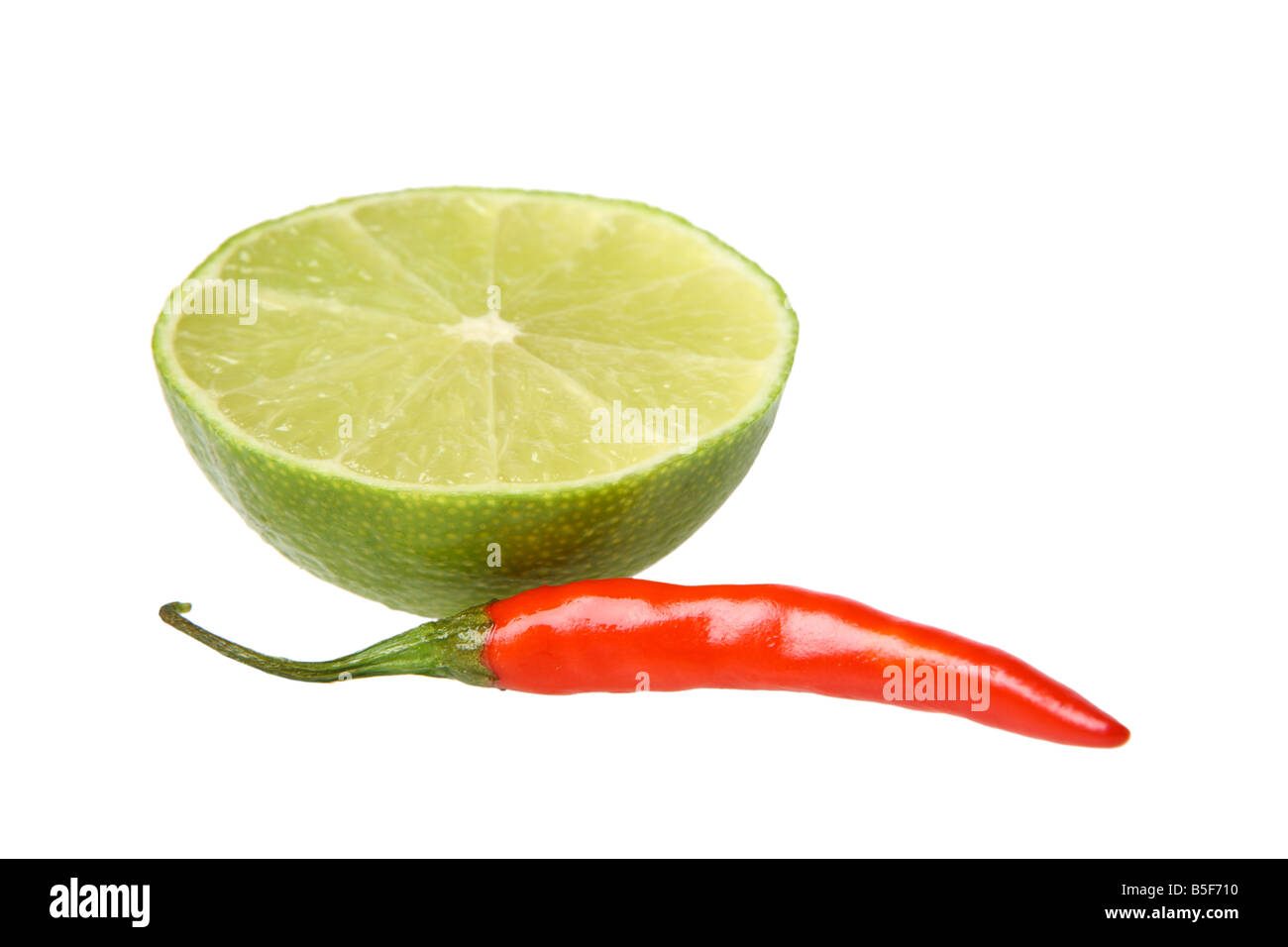 Chili pepper and Lime cutout on white background Stock Photo Alamy