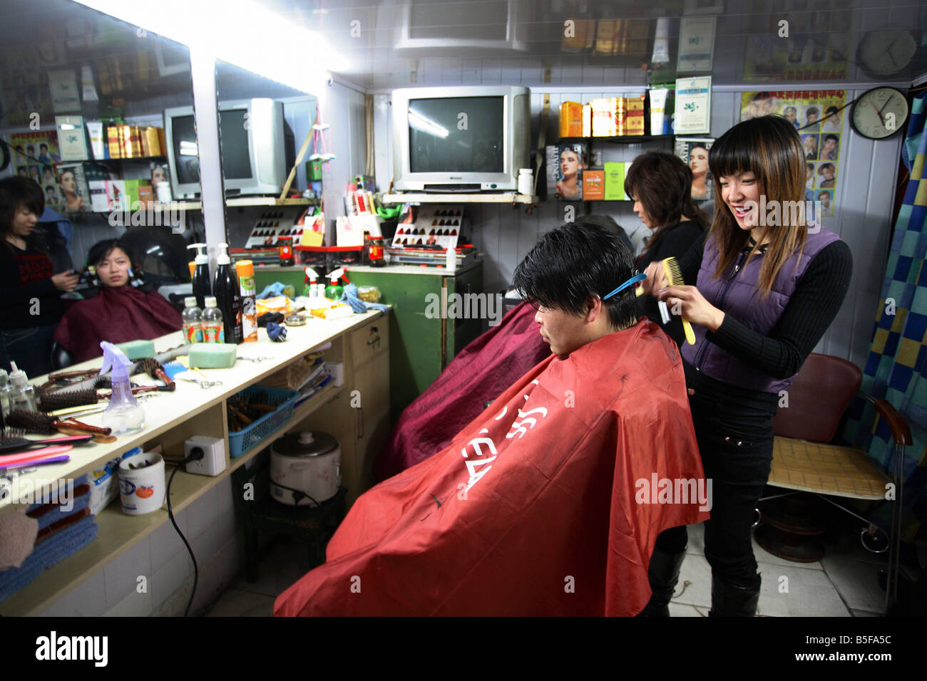Hairdressers during their work, Shanghai, China Stock Photo Alamy