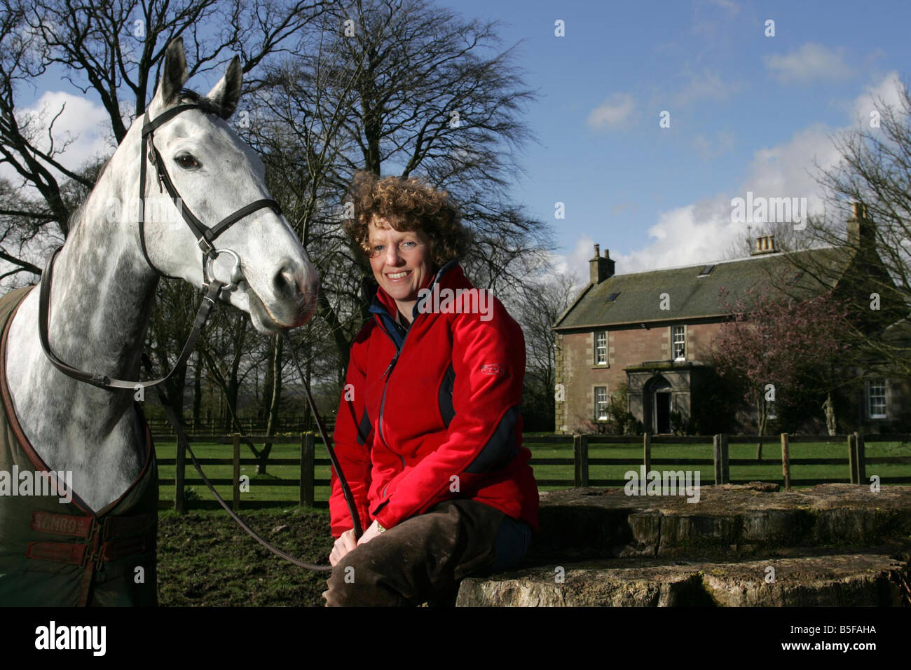 Racehorse Trainer Lucinda Russell with Horse Strong Resolve at their