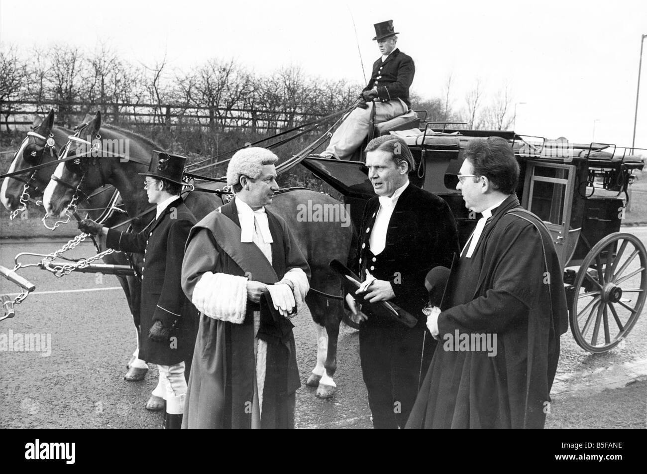 Mr Justice Smith Mr Paul Nicholson and Canon Alan Chesters with a coach Stock Photo