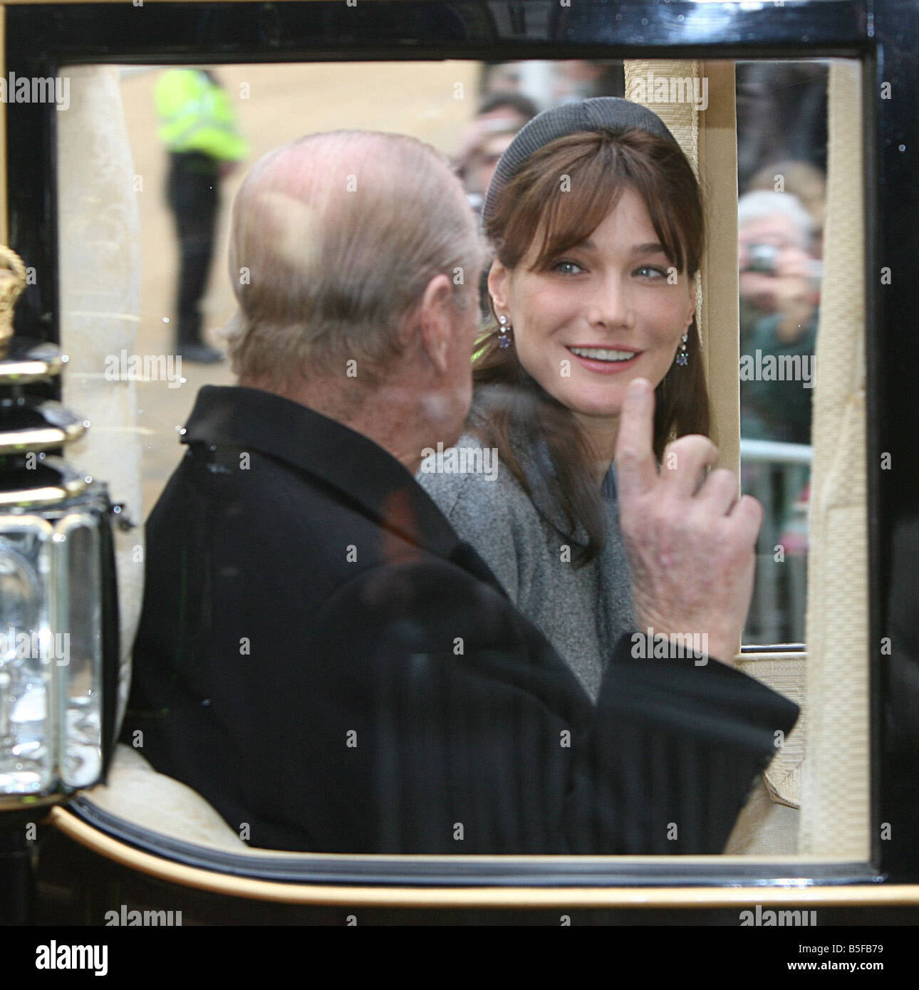 Prince Philip rides with Carla Sarkozy nee Bruni in a horse drawn ...