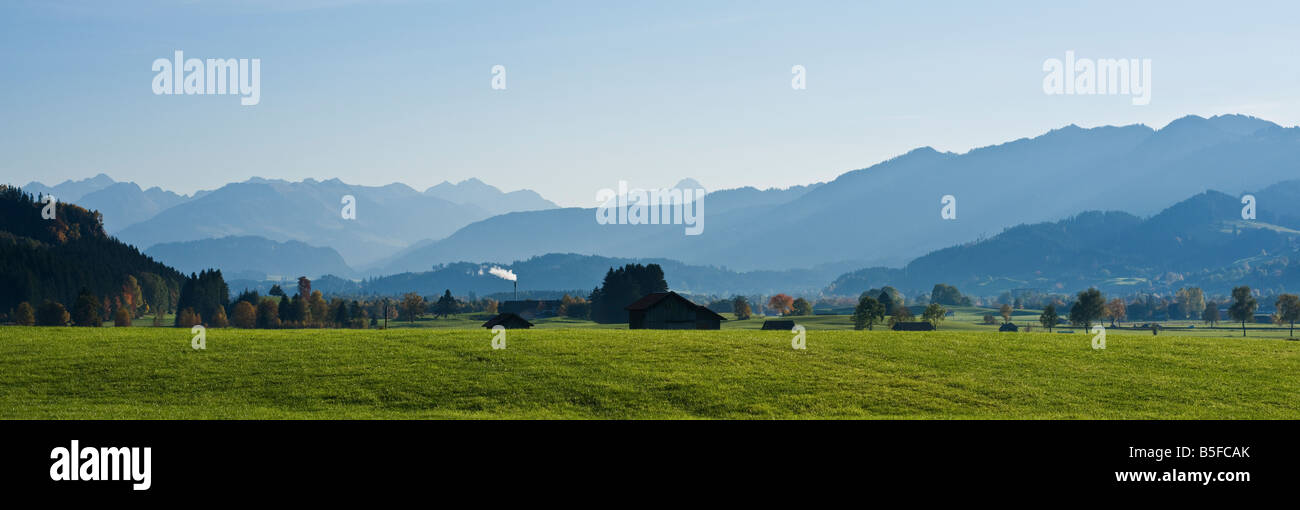 View towards village of Agathazell and mountains of the Allgäu region of southern Bavaria Germany Stock Photo