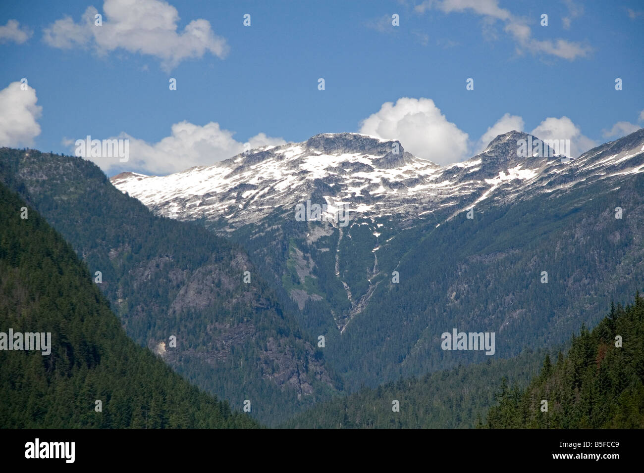Snow covered mountain peak in the North Cascade Range Washington Stock Photo