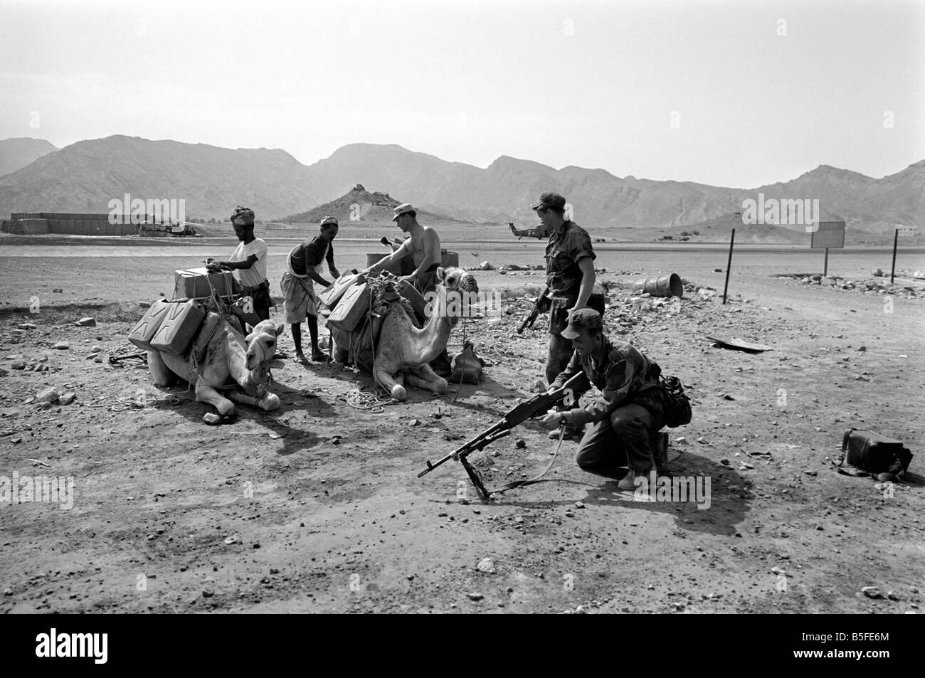 British Army in Aden with locals and camels. April 1966 W4001b007