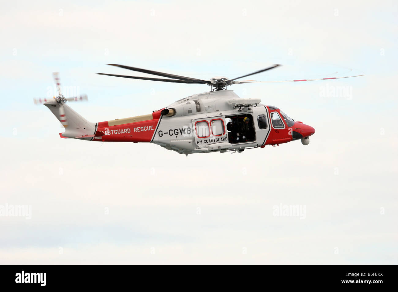 air sea rescue helicopter over dorset coast Stock Photo